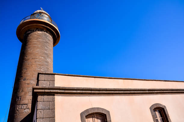 Photo Picture of an Old Lighthouse near the Sea