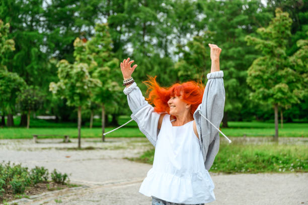 istock Senior woman in a public park 2132267176