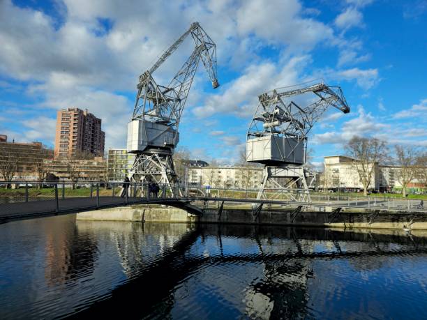 Strasbourg with two historic dock cranes at Presqu'île Malraux/Rivetoile. The image was capture dduring spring season.