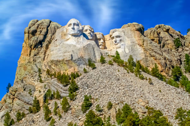 Mount Rushmore, South Dakota, USA Mount Rushmore, South Dakota, USA. George Washington, Thomas Jefferson, Theodore Roosevelt and Abraham Lincoln carved into the granite in the Black Hills, Keystone, South Dakota theodore roosevelt us president stock pictures, royalty-free photos & images