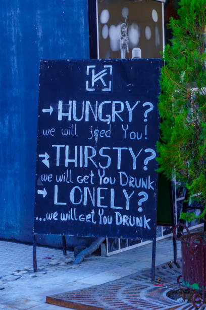 Skopje, North Macedonia - October 07, 2023: View of a funny bar sign, in Skopje, North Macedonia