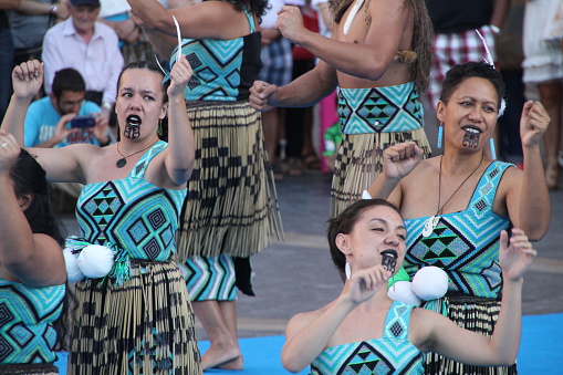 Bilba, Spain – July 24, 2015: A Maori folk dancer during a performance in a street festival