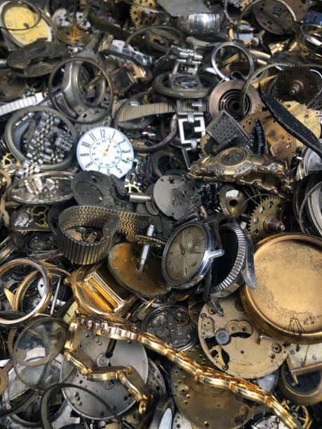 Pile of old clock parts.