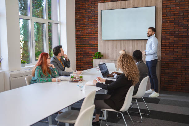 istock Successful businessman holding a corporate meeting 2132562729