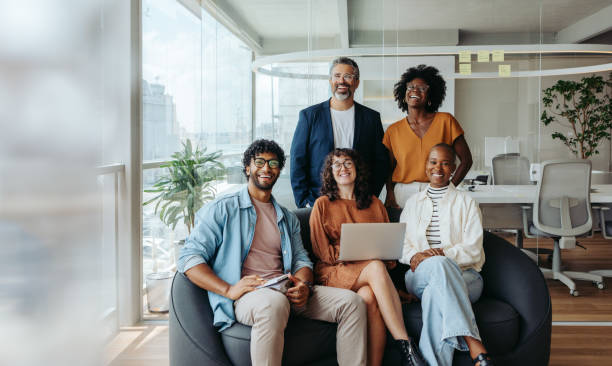 istock Successful team of creative professionals working together in an office 2132569743