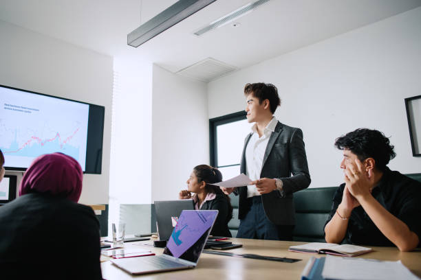 istock Discussing Business with Colleagues. 2132572895