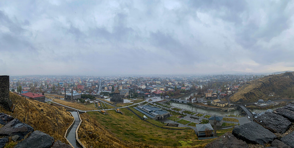 Cloudy cityscape. Kars in Turkey.