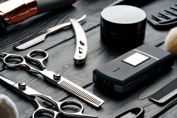 istock Professional Barber Tools Laid Out on Dark Wooden Surface 2132676009