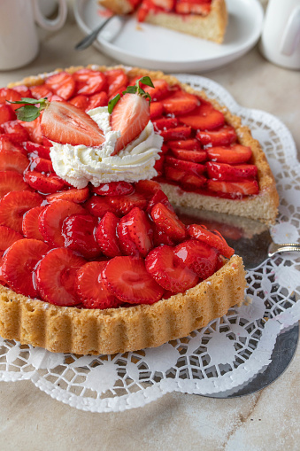 Strawberry cake. Traditional german sponge cake with fresh strawberries  on a table.