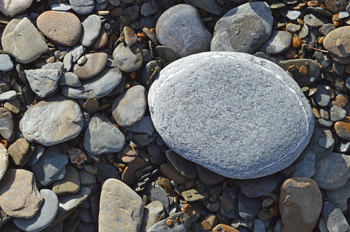 Sea stones, in studio, isolated on white background.