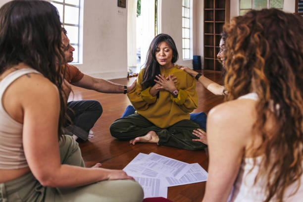 istock Group therapy, people meditation in circle on a group session 2132721044