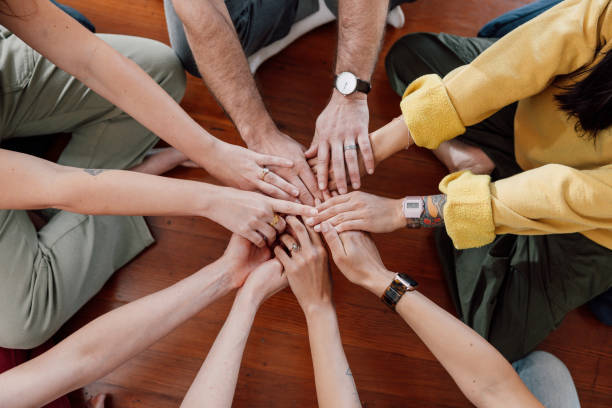 istock Group therapy, people meditation in circle on a group session 2132722602