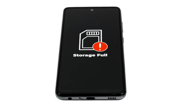 Cellular Problems Concepts. Smart phone with full storage icon on screen isolated on white background. All screen graphics are made up.