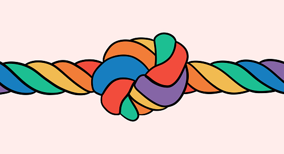 A coarse rope in the colors of the LGBT flag with a knot tied in the middle on an isolated background. Rainbow rope knot