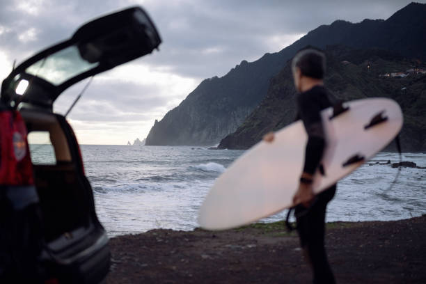 istock Surfing at dawn. The perfect surfing spot. 2132771694