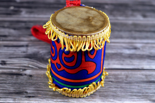 A Ramadan Decoration of a Mesaharaty drum covered with Kheyamiya cloth, Mesaharati is Ramadans traditional pre-dawn drummer, awakens people to eat the suhoor meal (last meal before fasting), selective focus