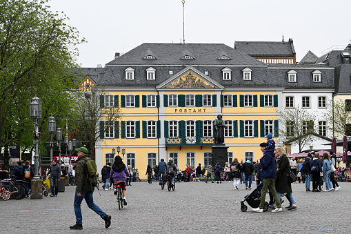 Bonn, Germany, March 30, 2024 - The Münsterplatz in Bonn with the main post office (also Fürstenberg-Palais, Fürstenbergisches Palais) and the Beethoven monument.