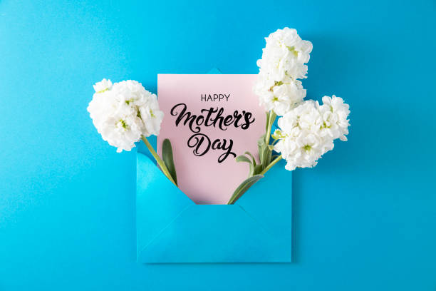 istock Flowers with Greeting Card in Blue Envelope for Mother's Day 2132804320