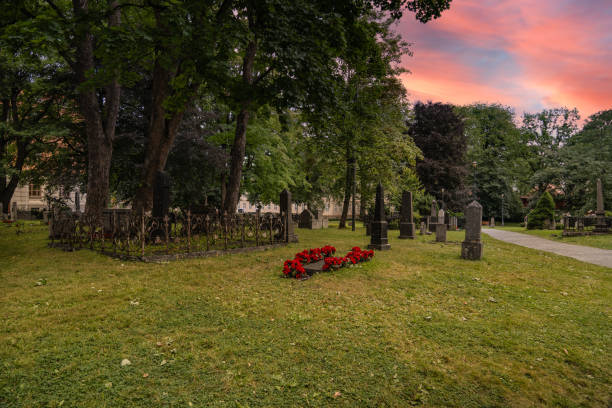 istock Sunset at Nidaros Cathedral Graveyard in Trondheim, Norway. 2132831874