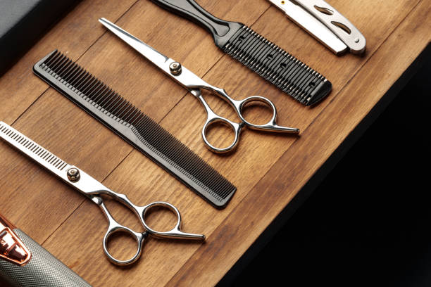 istock Professional Barber Tools Laid Out on Wooden Surface for Mens Grooming Session 2132862250