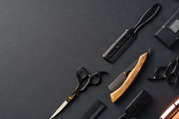 istock An Assortment of Professional Hairdressing Tools Laid Out on a Dark Surface 2132862253