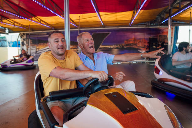 istock Men Riding the Bumper Cars 2132939399