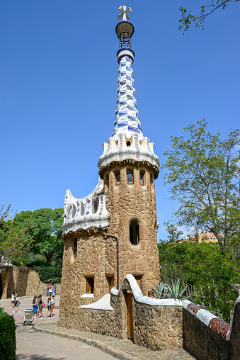 Barcelona, Spain – August 29, 2023: A charming stone building in Park Guell, Barcelona, Spain