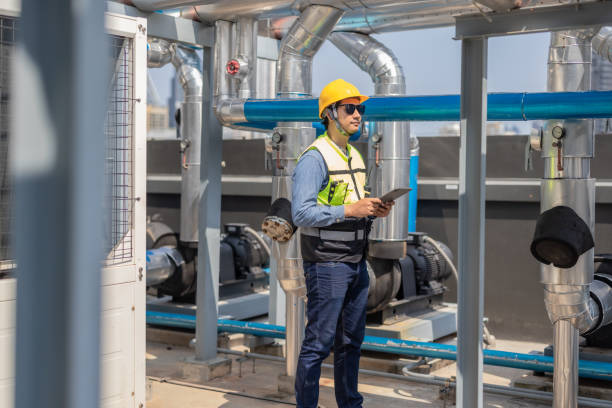 istock HVAC technician analyzes mechanical, electrical, plumbing systems with energy efficiency plan 2132995533
