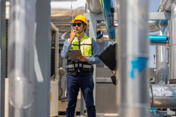 istock HVAC technician analyzes mechanical, electrical, plumbing systems with energy efficiency plan 2133003843