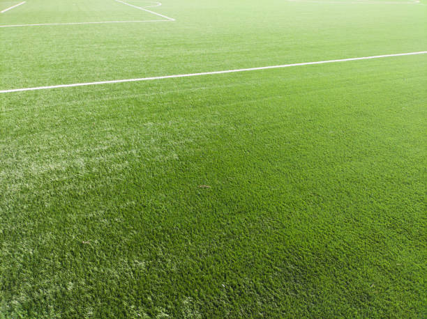 istock green grass football field ground 2133010581