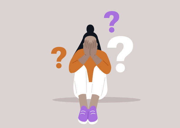 istock Dilemma of Uncertainty, A Person Surrounded by Questions, a character sits overwhelmed with hands covering their face, flanked by floating question marks 2133042546