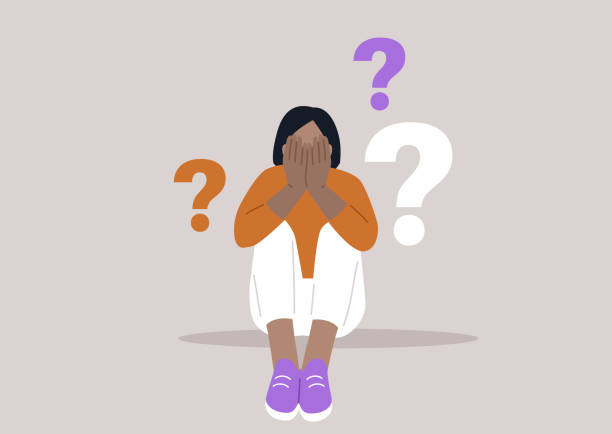 istock Dilemma of Uncertainty, A Person Surrounded by Questions, a character sits overwhelmed with hands covering their face, flanked by floating question marks 2133042547