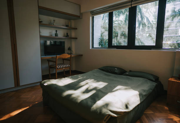 istock bedroom in morning with sunlight 2133068575