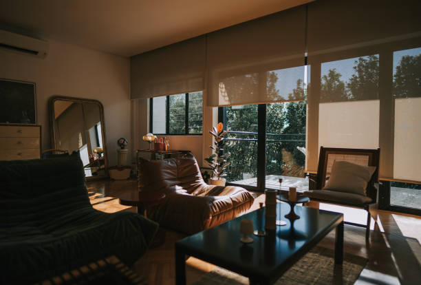 Living room in morning illuminated by sunlight through window