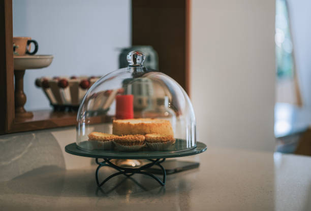 Egg tart and cheese cake in cake stand at Domestic Kitchen counter