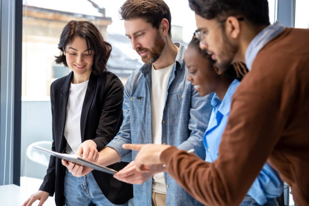 istock Diverse colleagues cooperating together at office 2133105382