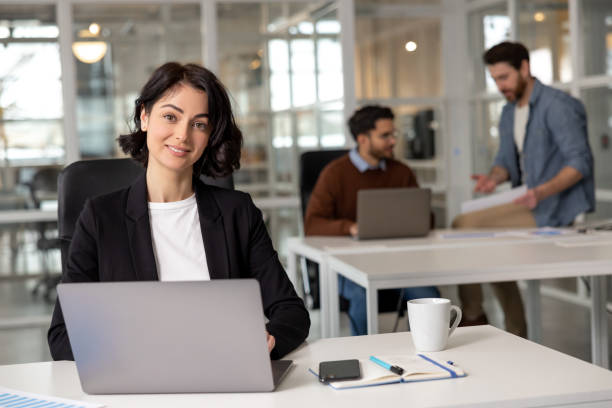 istock Professional woman manager operating laptop foe work in office 2133106465