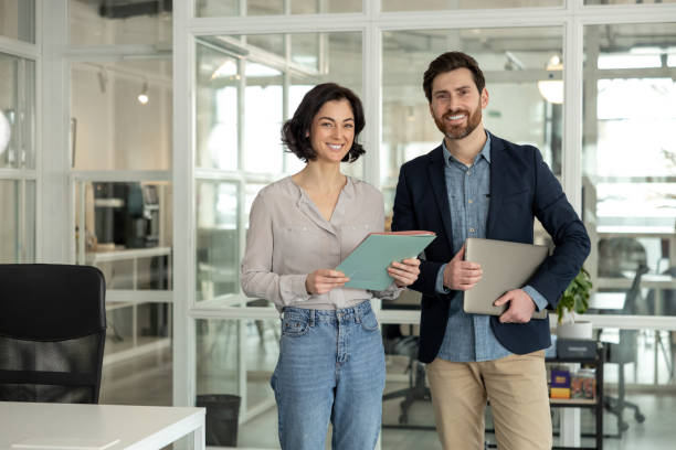 istock Colleagues discussing about project in office 2133107606