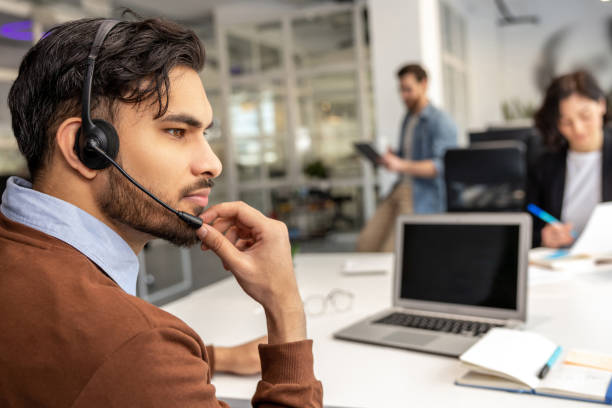 istock Ambitious employees working in professional coworking space 2133108141