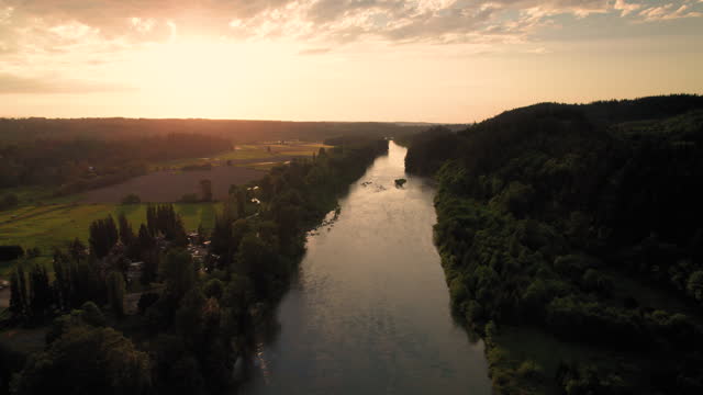 American Farms Drone Shot Over River at Sunset