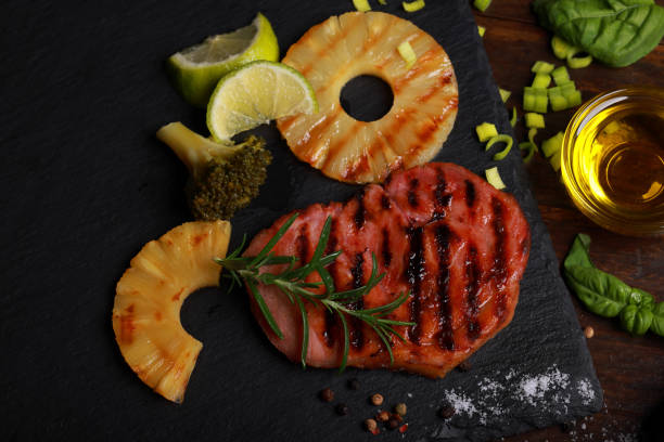 Pork Fillet Chops and Pineapple on slate platter
