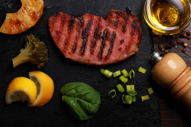 Pork Fillet Chops and Pineapple on slate platter