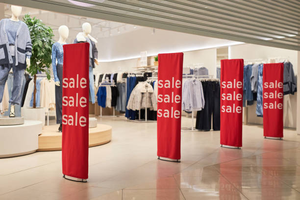 istock Storefront with Sale Signs 2133221233