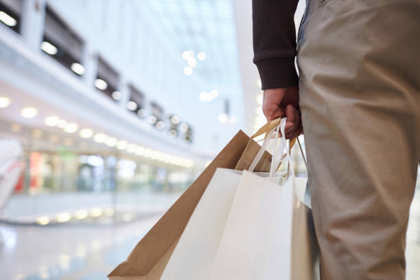 istock Man holding shopping bags 2133221784