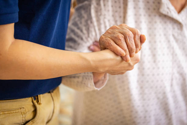 istock Nurse, hands and senior patient in empathy 2133233707