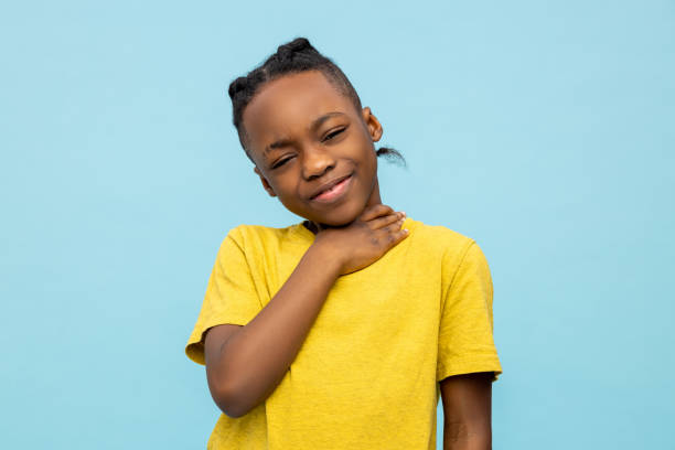 istock Sick African American little boy suffering sore throat 2133250892