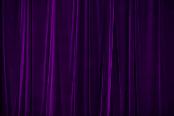 istock purple curtain in theatre. 2133258664