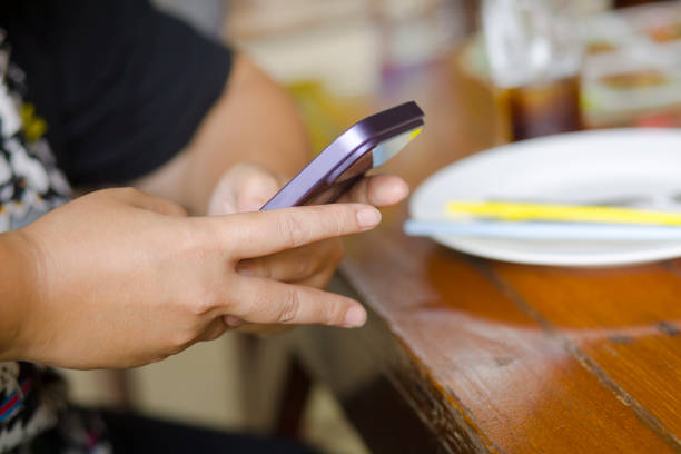 Thai woman using smart phone
