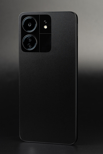 Modern black color smartphone  with tripple camera set