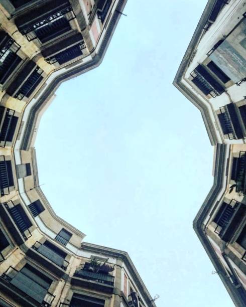 Photography from below of Milans Square in Barcelona. Essential place if you visit the city due to its curious shape